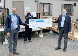 L-R Alan MacDonald, David Townsend and Jon Dessau at the cheque presentation.